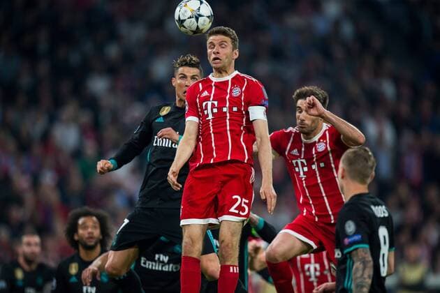 25.04.2018 MONACHIUM, PILKA NOZNA (FOOTBALL), UEFA LIGA MISTRZOW (UEFA CHAMPIONS LEAGUE), SEZON 2017 2018 , 1 4 FINAL (QUARTER-FINALS) MECZ FC BAYERN MONACHIUM - REAL MADRYT (FC BAYERN MUNCHEN - REAL MADRID) NZ CRISTIANO RONALDO THOMAS MULLER FOTO LUKASZ SKWIOT CYFRASPORT NEWSPIX.PL --- Newspix.pl FRANCE OUT!  20180425CSLS0074