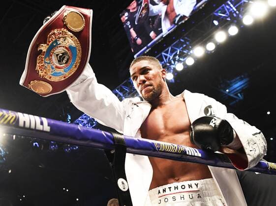 GroÃŸbritannien, Black History Month im Oktober - Sport 31st March 2018, Principality Stadium, Cardiff, Wales; WBA, IBF, WBO and IBO Heavyweight Boxing Championship, Anthony Joshua versus Joseph Parker; Anthony Joshua holds up the WBO belt that was held by Parker.  ActionPlus12017100