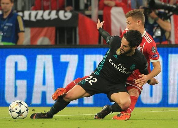 (180426) -- MUNICH, April 26, 2018 -- Real Madrid s Isco (front) vies with Bayern Munich s Joshua Kimmich during the first leg match of the UEFA Champions League semifinal between Bayern Munich of Germany and Real Madrid of Spain in Munich, Germany, on April 25, 2018. Real Madrid won 2-1. ) (SP)GERMANY-MUNICH-SOCCER-UEFA CHAMPIONS LEAGUE-BAYERN MUNICH VS REAL MADRID PhilippexRuiz 