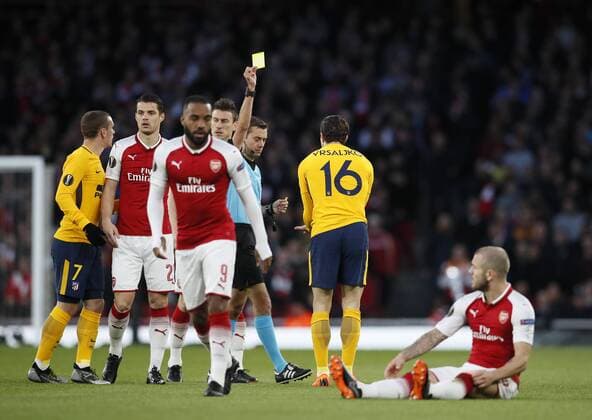 Arsenal s Jack Wilshere gets fouled by Atletico s Sime Vrsaljko who gets booked during the Europa League Semi Final 1st Leg, match at the Emirates Stadium, London. Picture date: 26th April 2018. Picture credit should read: David Klein Sportimage EDITORIAL USE ONLY. No use with unauthorised audio, video, data, fixture lists, club league logos or live services. Online in-match use limited to 120 images, no video emulation. No use in betting, games or single club league player publications.