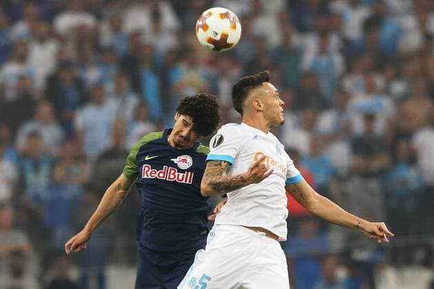 SOCCER - EL, Marseille vs RBS MARSEILLE,FRANCE,26.APR.18 - SOCCER - UEFA Europa League, semifinal, Olympique de Marseille vs Red Bull Salzburg. Image shows Andre Ramalho (RBS) and Lucas Ocampos (Marseille). GEPAxpictures xMathiasxMandl