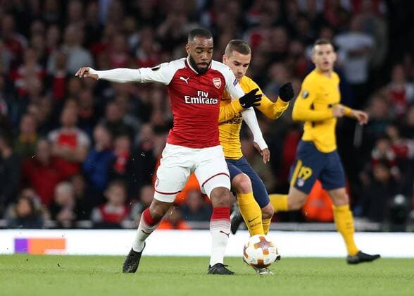26th April 2018, Emirates Stadium, London, England; UEFA Europa League football, semi final, 1st leg, Arsenal versus Atletico Madrid; Alexandre Lacazette of Arsenal and Antoine Griezmann of Atletico Madrid compete for the ball  ActionPlus12017268