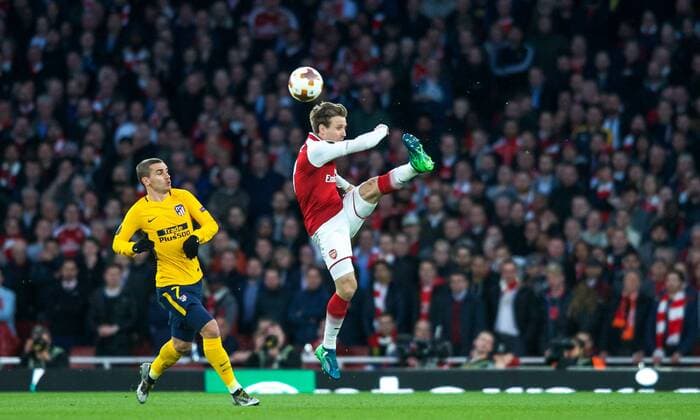 Nacho Monreal of Arsenal clears from Antoine Griezmann of Atletico Madrid during the UEFA Europa League Semi Final 1st leg match between Arsenal and Atletico Madrid at the Emirates Stadium, London, England on 26 April 2018. Copyright: xAndyxAleksiejczukx PMI-1995-0017