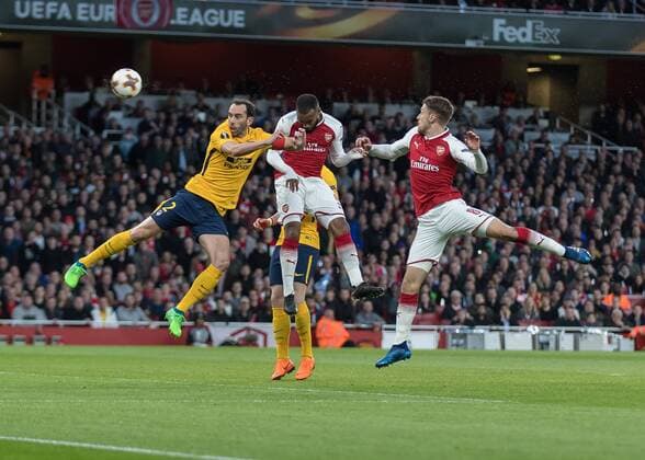 Football - 2017 2018 UEFA Europa League - Semi-Final, First Leg: Arsenal vs. Atletico Madrid Alexandre Lacazette (Arsenal FC) rises highest to head at goal at The Emirates. COLORSPORT DANIEL BEARHAM  csp_ars_ama_260418_