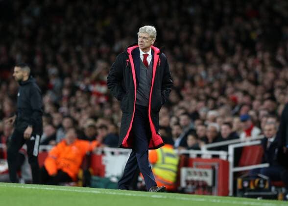 26th April 2018, Emirates Stadium, London, England; UEFA Europa League football, semi final, 1st leg, Arsenal versus Atletico Madrid; Arsenal manager Arsene Wenger looks on from the touchline wearing his winter coat  ActionPlus12017277