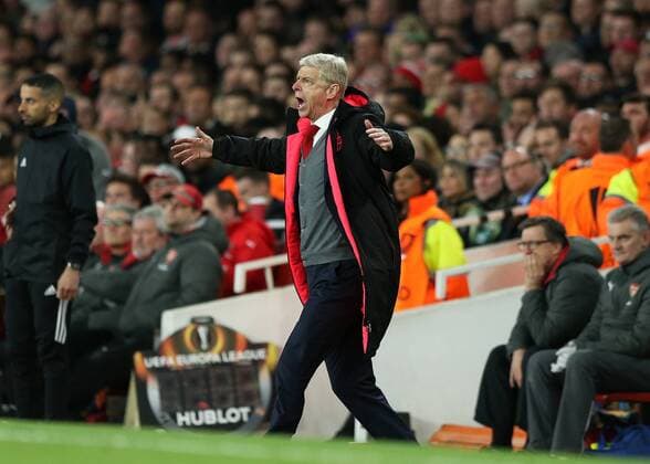 26th April 2018, Emirates Stadium, London, England; UEFA Europa League football, semi final, 1st leg, Arsenal versus Atletico Madrid; Arsenal manager Arsene Wenger rushes to the touchline to scream at Referee Clement Turpin  ActionPlus12017311