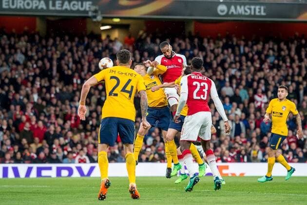 Alexandre Lacazette of Arsenal scores the opening goal during the UEFA Europa League Semi Final match between Arsenal and Atletico Madrid at the Emirates Stadium, London, England on 26 April 2018. Copyright: xSalvioxCalabresex 19780032