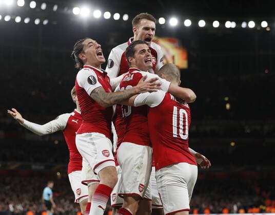 Alexandre Lacazette of Arsenal is mobbed as Arsenal celebrate the first goal during the Europa League Semi Final 1st Leg, match at the Emirates Stadium, London. Picture date: 26th April 2018. Picture credit should read: David Klein Sportimage EDITORIAL USE ONLY. No use with unauthorised audio, video, data, fixture lists, club league logos or live services. Online in-match use limited to 120 images, no video emulation. No use in betting, games or single club league player publications.