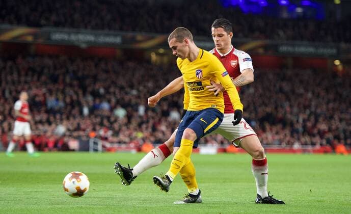 Antoine Griezmann of Atletico Madrid & Shkodran Mustafi of Arsenal during the UEFA Europa League Semi Final 1st leg match between Arsenal and Atletico Madrid at the Emirates Stadium, London, England on 26 April 2018. Copyright: xAndyxAleksiejczukx PMI-1995-0033
