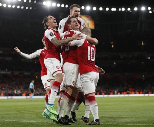 Alexandre Lacazette of Arsenal is mobbed as Arsenal celebrate the first goal during the Europa League Semi Final 1st Leg, match at the Emirates Stadium, London. Picture date: 26th April 2018. Picture credit should read: David Klein Sportimage EDITORIAL USE ONLY. No use with unauthorised audio, video, data, fixture lists, club league logos or live services. Online in-match use limited to 120 images, no video emulation. No use in betting, games or single club league player publications.