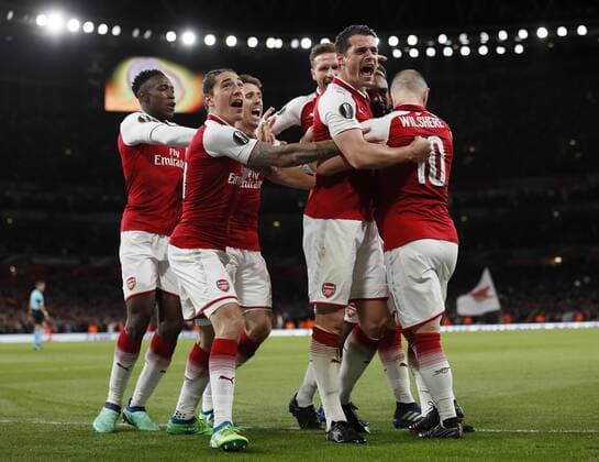 Alexandre Lacazette of Arsenal is mobbed at the players celebrate the first goal during the Europa League Semi Final 1st Leg, match at the Emirates Stadium, London. Picture date: 26th April 2018. Picture credit should read: David Klein Sportimage EDITORIAL USE ONLY. No use with unauthorised audio, video, data, fixture lists, club league logos or live services. Online in-match use limited to 120 images, no video emulation. No use in betting, games or single club league player publications.