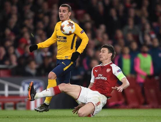 Arsenal v Atletico Madrid UEFA Europa League Semi-Final Atletico Madrid?s Antoine Griezmann beats Arsenal s Laurent Koscielny to the ball on his way to scoring their first goal during the UEFA Europa League Semi-Final match at the Emirates Stadium, London Content Not Available For UK Newspapers Copyright: xDanielxHamburyx FIL-11704-0050