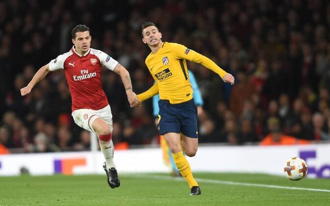 Arsenal v Atletico Madrid UEFA Europa League Semi-Final Arsenal s Shkodran Mustafi and Atletico Madrid?s Lucas Hernandez battle for the ball during the UEFA Europa League Semi-Final match at the Emirates Stadium, London Content Not Available For UK Newspapers Copyright: xDanielxHamburyx FIL-11704-0058