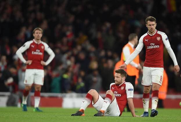 Arsenal v Atletico Madrid UEFA Europa League Semi-Final Arsenal s Nacho Monreal, Shkodran Mustafi and Aaron Ramsey react at full time during the UEFA Europa League Semi-Final match at the Emirates Stadium, London Content Not Available For UK Newspapers Copyright: xDanielxHamburyx FIL-11704-0069