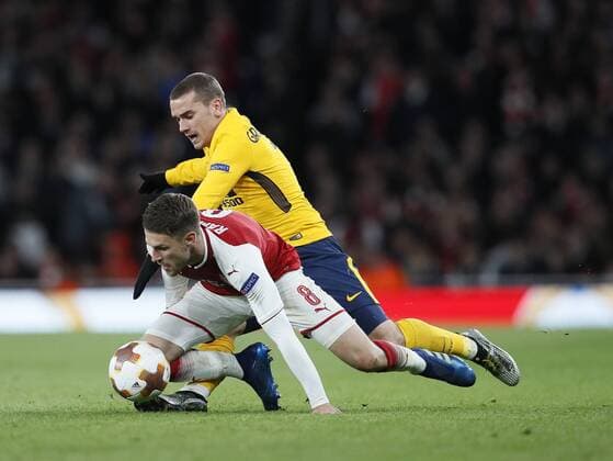 Arsenal s Aaron Ramsey tussles with Atletico s Antoine Griezmann during the Europa League Semi Final 1st Leg, match at the Emirates Stadium, London. Picture date: 26th April 2018. Picture credit should read: David Klein Sportimage EDITORIAL USE ONLY. No use with unauthorised audio, video, data, fixture lists, club league logos or live services. Online in-match use limited to 120 images, no video emulation. No use in betting, games or single club league player publications.