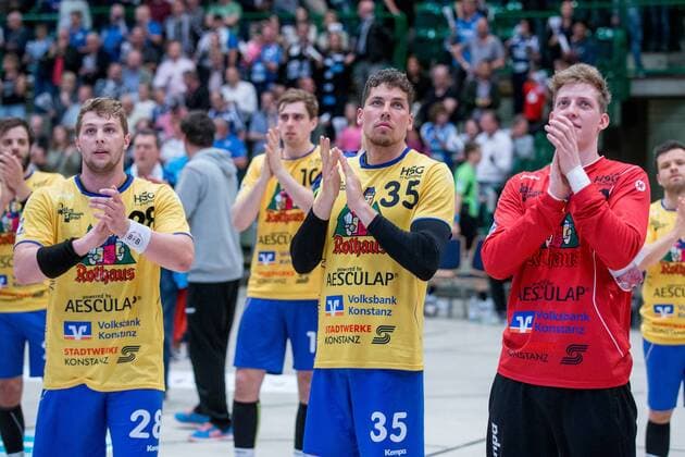 Chris Berchtenbreiter 28 HSG Konstanz Maximilian Schwarz 35 HSG Konstanz and Konstantin Poltrum 12 HSG Konstanz after the match Bergischer HC vs HSG Konstanz Handball 2 Handball Bundesliga 28 04 18 Wuppertal NRW Germany Uni Halle Copyright: xcdnx