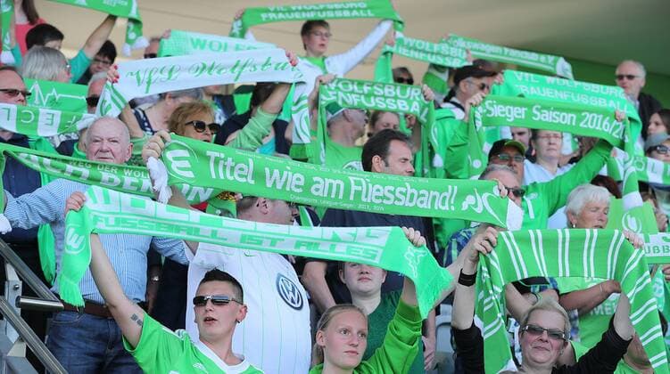 Wolfsburg fans celebrate their team