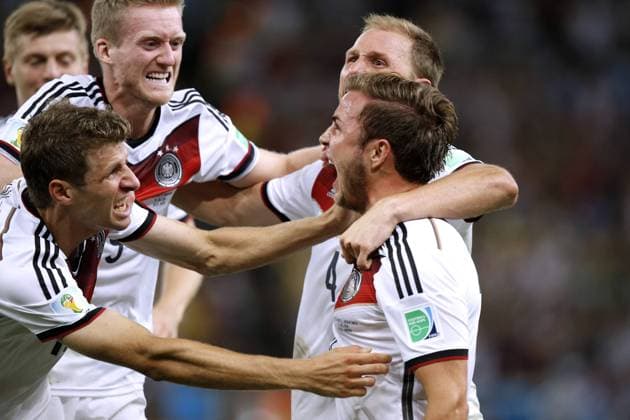 GOETZE Mario Team Germany celebrates after scoring 1 0 Final score with MUELLER Thomas and SCHUERRLE Andre World Cup 2014 Brasil FIFA World Cup Brazil 2014 Final game Germany v Argentina 1 0 on 13 July 2014 in Rio de Janeiro