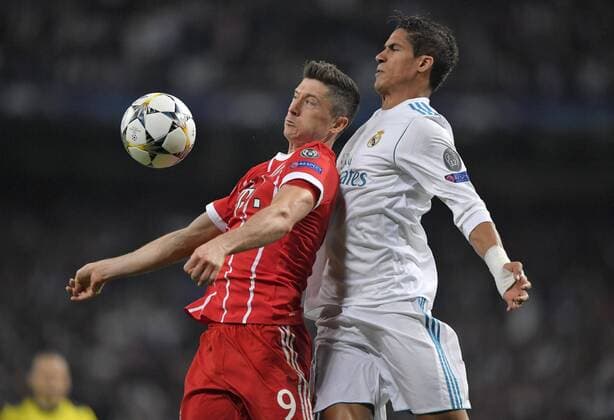 01 05 2018 Football UEFA Champions League 2017 2018 Final Semifinal Real Madrid FC Bayern Munich at Bernabeu Stadium Madrid v left Robert Lewandowski FC Bayern Munich against Raphael Varane Real Madrid