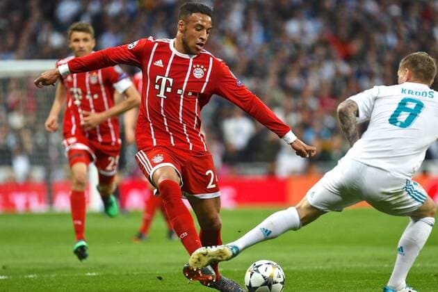 Real Madrid v Bayern Munich UEFA Champions League Semi-Final Corentin Tolisso of FC Bayern Munich (left) during the UEFA Champions League Semi-Final match at the Estadio Santiago Bernabeu, Madrid Content Not Available For UK Newspapers Copyright: xKristianxKanex FIL-11726-0026