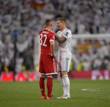 01 05 2018 Football UEFA Champions League 2017 2018 Semifinal Second leg Real Madrid FC Bayern Munich at Bernabeu Stadium Madrid Joshua Kimmich FC Bayern Munich disappointed after the match Toni Kroos Real Madrid consoles him