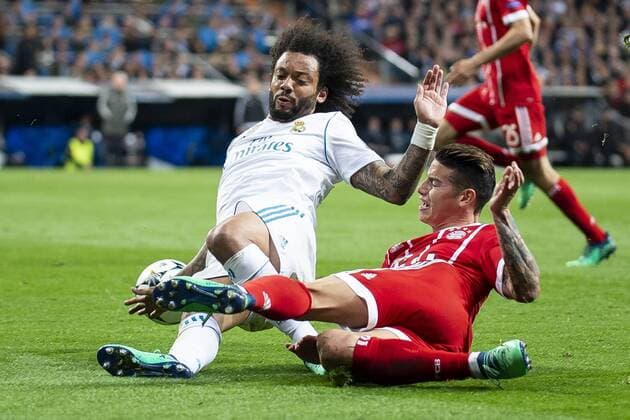 Bilder des Tages - SPORT Real Madrid Marcelo and Bayern Munich James Rodriguez during Semi Finals UEFA Champions League match between Real Madrid and Bayern Munich at Santiago Bernabeu Stadium in Madrid, Spain. May 01, 2018.  (20180501037)