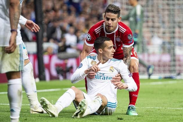 Real Madrid Lucas Vazquez and Bayern Munich James Rodriguez during Semi Finals UEFA Champions League match between Real Madrid and Bayern Munich at Santiago Bernabeu Stadium in Madrid, Spain. May 01, 2018.  (20180501039)