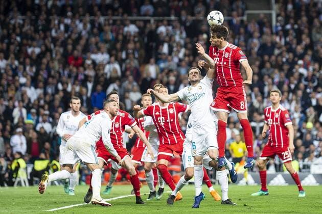 Real Madrid Nacho Fernandez and Sergio Ramos and Bayern Munich Javi Martinez during Semi Finals UEFA Champions League match between Real Madrid and Bayern Munich at Santiago Bernabeu Stadium in Madrid, Spain. May 01, 2018.  (20180501043)
