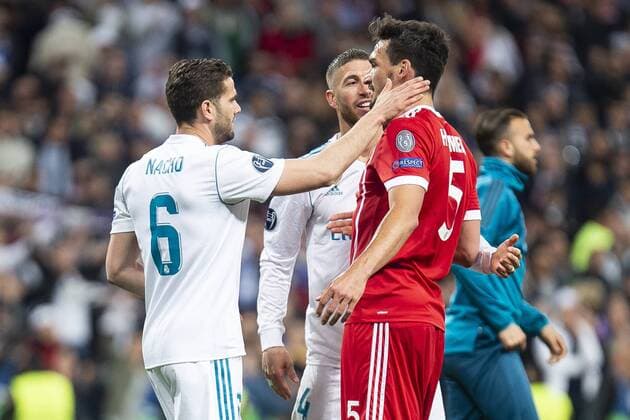 Real Madrid Nacho Fernandez and Sergio Ramos and Bayern Munich Mats Hummels during Semi Finals UEFA Champions League match between Real Madrid and Bayern Munich at Santiago Bernabeu Stadium in Madrid, Spain. May 01, 2018.  (20180501047)
