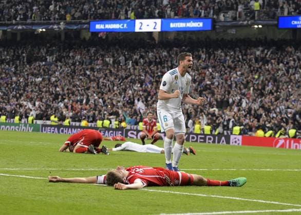 01 05 2018 Football UEFA Champions League 2017 2018 Semifinal Second leg Real Madrid FC Bayern Munich at Bernabeu Stadium Madrid Frustration after leaving the Champions League Thomas Müller in front Bayern Munich beaten on the ground Robert Lewandowski hi Bayern Munich disappointed Nacho Fernandez Real Madrid celebrate