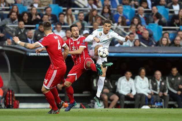 May 1, 2018 - Madrid, Spain - CRISTIANO RONALDO of Real Madrid duels for the ball with MATS HUMMELS Bayern Munich during the UEFA Champions League, semi final, 2nd leg football match between Real Madrid CF and FC Bayern Munich on May 1, 2018 at Santiago Bernabeu stadium in Madrid, Spain Football - UEFA Champions League - Real Madrid CF vs FC Bayern Munich  - ZUMAb169 20180501_zaa_b169_001 Copyright: xManuelxBlondeau Aop.Pressx
