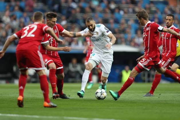 May 1, 2018 - Madrid, Spain - KARIM BENZEMA of Real Madrid duels for the ball with NIKLAS SULE Bayern Munich during the UEFA Champions League, semi final, 2nd leg football match between Real Madrid CF and FC Bayern Munich on May 1, 2018 at Santiago Bernabeu stadium in Madrid, Spain Football - UEFA Champions League - Real Madrid CF vs FC Bayern Munich  - ZUMAb169 20180501_zaa_b169_002 Copyright: xManuelxBlondeau Aop.Pressx