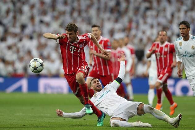 May 1, 2018 - Madrid, Spain - THOMAS MULLER Bayern Munich evades SERGIO RAMOS of Real Madrid during the UEFA Champions League, semi final, 2nd leg football match between Real Madrid CF and FC Bayern Munich on May 1, 2018 at Santiago Bernabeu stadium in Madrid, Spain Football - UEFA Champions League - Real Madrid CF vs FC Bayern Munich  - ZUMAb169 20180501_zaa_b169_017 Copyright: xManuelxBlondeau Aop.Pressx