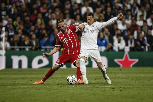 1st May 2018, Santiago Bernabeu, Madrid, Spain; UEFA Champions League football, semi final, 2nd leg, Real Madrid versus Bayern Munich; Franck Ribery (Mun) fights for control of the ball with Lucas Vazquez (Real Madrid)  ActionPlus12018792