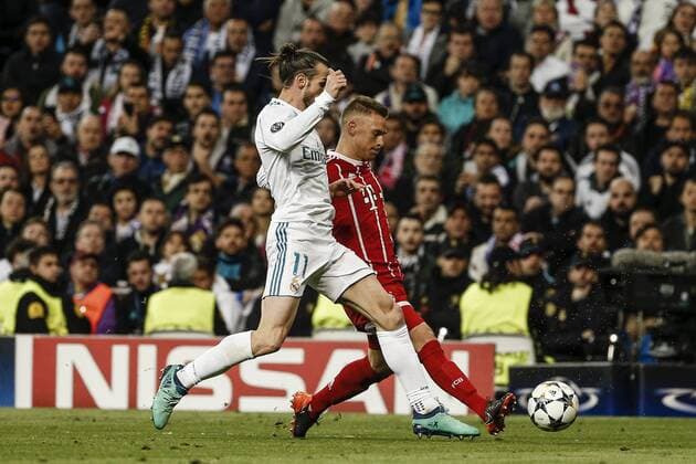 1st May 2018, Santiago Bernabeu, Madrid, Spain; UEFA Champions League football, semi final, 2nd leg, Real Madrid versus Bayern Munich; Gareth Bale (Real Madrid) fights for control of the ball with Joshua Kimmich (Mun)  ActionPlus12018793