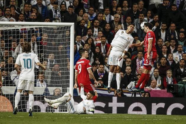 1st May 2018, Santiago Bernabeu, Madrid, Spain; UEFA Champions League football, semi final, 2nd leg, Real Madrid versus Bayern Munich; Raphael Varane (Real Madrid) fights for the header with Mats Hummels (Mun)  ActionPlus12018795