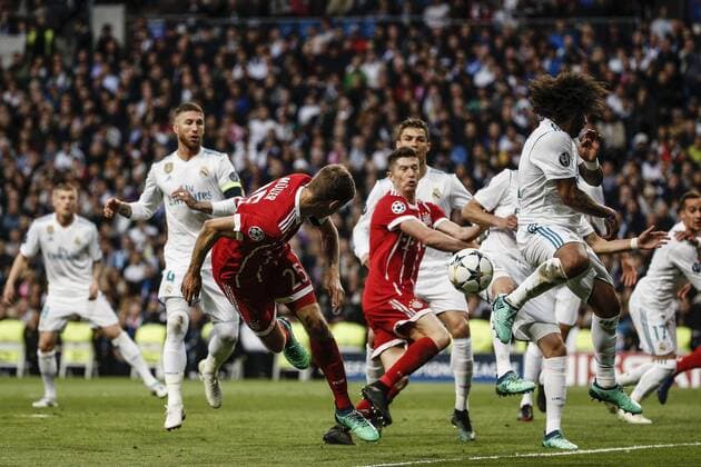 1st May 2018, Santiago Bernabeu, Madrid, Spain; UEFA Champions League football, semi final, 2nd leg, Real Madrid versus Bayern Munich; Marcelo Viera (Real Madrid) blocks the header from Muller (Mun)  ActionPlus12018774