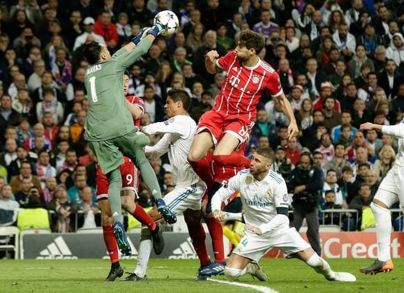FOOTBALL CHAMPIONS LEAGUE SEASON 2017 2018 SEMI-FINAL RUECKSPIEL Real Madrid FC Bayern Muenchen 01 05 2018 Javi Martinez 2 v re FC Bayern Munich against goalkeeper Keylor Navas Real Madrid and Raphael Varane 2 v left Real Madrid and Sergio Ramos re Real Madrid Madrid