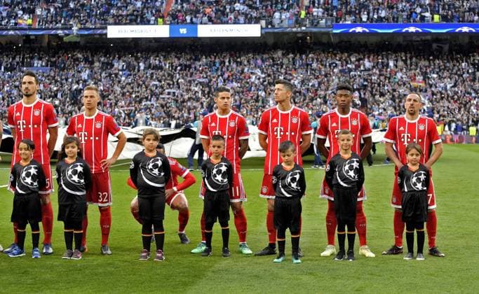 01 05 2018 Football UEFA Champions League 2017 2018 Semifinal Second leg Real Madrid FC Bayern Munich at Bernabeu Stadium Madrid A Bayern player seems to be hiding behind the escort child 3 v thi Thiago FC Bayern Munich v li Mats Hummels Bayern Munich Joshua Kimmich FC Bayern Munich Thiago FC Bayern Munich James Rodriguez FC Bayern Munich Robert Lewandowski FC Bayern Munich David Alaba FC Bayern Munich Franck Ribery FC Bayern Munich