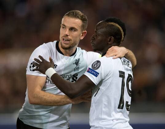 A.S. Roma v Liverpool UEFA Champions League Semi-Final Jordan Henderson of Liverpool (left) congratulates his team-mate Sadio Mane of Liverpool after Mane made it 1-0 to their team during the UEFA Champions League Semi-Final match at the Stadio Olimpico, Rome Content Not Available For UK Newspapers Copyright: xRussellxHartx FIL-11735-0015