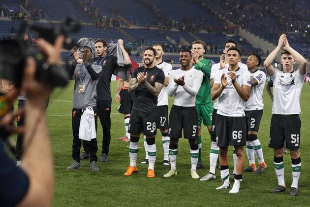 ROME, 02-04-2018 , Stadium Olimpico , season 2017 2018 , Champions League semi final second leg. Liverpool player Danny Ings (L) Liverpool player Georginio Wijnaldum (C) Liverpool player Trent Alexander Arnold (R) and Liverpool player Ben Woodburn (RR) celebrating the victory after the game during the game AS Roma - Liverpool AS Roma - Liverpool  x2162583x