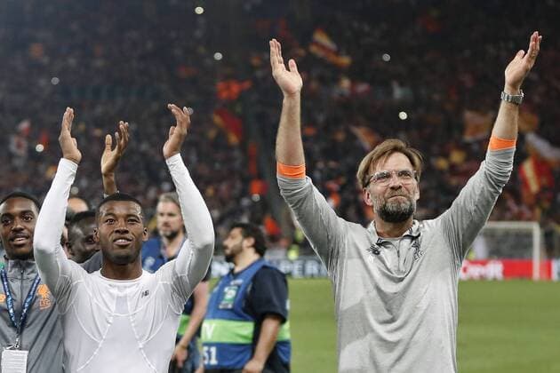 ROME, 02-04-2018 , Stadium Olimpico , season 2017 2018 , Champions League semi final second leg. Liverpool player Georginio Wijnaldum (L) and Liverpool trainer coach Jurgen Klopp (R) celebrating the victory after the game after the game AS Roma - Liverpool AS Roma - Liverpool  x2162586x