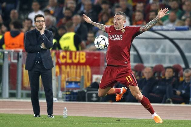 ROME, 02-04-2018 , Stadium Olimpico , season 2017 2018 , Champions League semi final second leg. AS Roma player Aleksandar Kolarov (R) on the ball with AS Roma trainer coach Eusebio Di Francesco (L) looking at him during the game AS Roma - Liverpool . AS Roma - Liverpool  x2162627x
