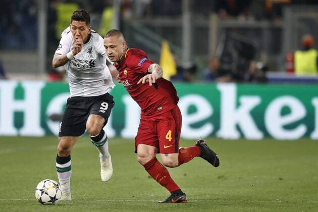 ROME, 02-04-2018 , Stadium Olimpico , season 2017 2018 , Champions League semi final second leg. AS Roma player Radja Nainggolan (R) in duel with Liverpool player Roberto Firmino (L) during the game AS Roma - Liverpool. AS Roma - Liverpool  x2162687x