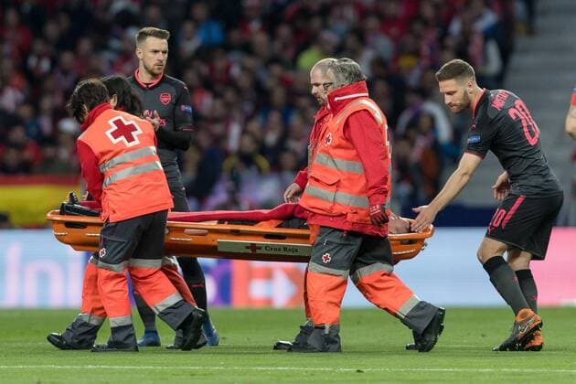 Spain Madrid 03 05 2018 UEFA Europa League 2017 2018 Season Semi finals Second leg Semi-final Atletico Madrid Arsenal FC Laurent Koscielny AFC is driven off the field Shkodran Mustafi AFC is watching DeFodi048