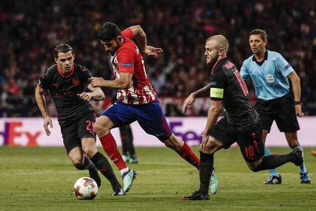 3rd May 2018, Wanda Metropolitano, Madrid, Spain; UEFA Europa League football, semi final, 2nd leg, Atletico Madrid versus Arsenal; Diego Costa (Atletico de Madrid) drives forward on the ball past Jack Wilshere (Arsenal)  ActionPlus12019229