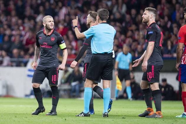 Arsenal FC Jack Wilshere and Shkodran Mustafi talking with the referee during Europa League Semi Finals First Leg match between Atletico de Madrid and Arsenal FC at Wanda Metropolitano in Madrid, Spain. May 03, 2018.  (20180503015)