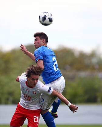 4th May, St Georges Park, Burton-on-Trent, England; UEFA Under 17 European Championships, Italy U17s versus Switzerland U17s; Ruwen Werthmuller of Switzerland wins a header against Alberto Barazzetta of Italy  ActionPlus12019480