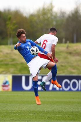 4th May, St Georges Park, Burton-on-Trent, England; UEFA Under 17 European Championships, Italy U17s versus Switzerland U17s; Edoardo Vergani of Italy controls the ball under heavy pressure from Drilon Kastrati of Switzerland  ActionPlus12019488
