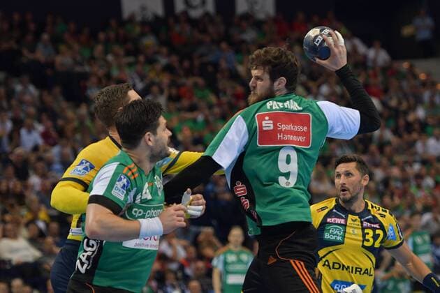 HBL DHB Cup Final Rhein Neckar Loewen vs TSV Hannover Burgdorf 05 05 18 Barcelycard Arena Hamburg HBL DHB Cup Final Rhein Neckar vs TSV Hannover Burgdorf im Bild Mait Petrail Hannover 09 tries to beat Hendrik Pekeler Loewen 23 nordphoto xWitke nph00002
